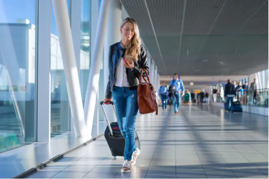 Girl enjoying a comfortable flight while traveling for luxury addiction treatment with personalized travel assistance