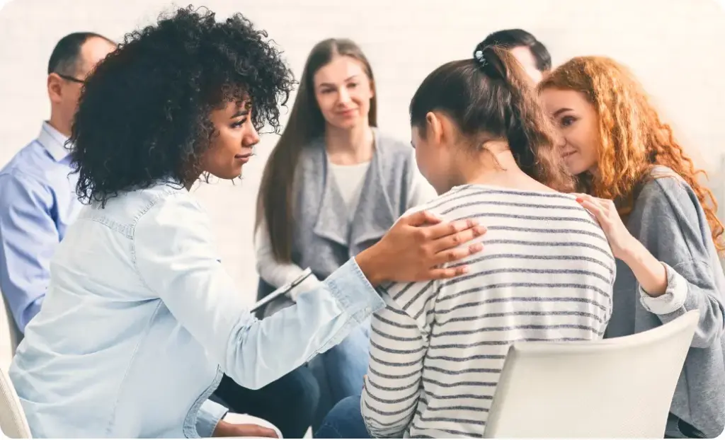 Supportive group therapy session at a luxury addiction treatment center in New Jersey