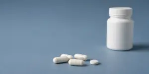 Close-up of Lyrica (pregabalin) pills illustrating potential side effects of the medication